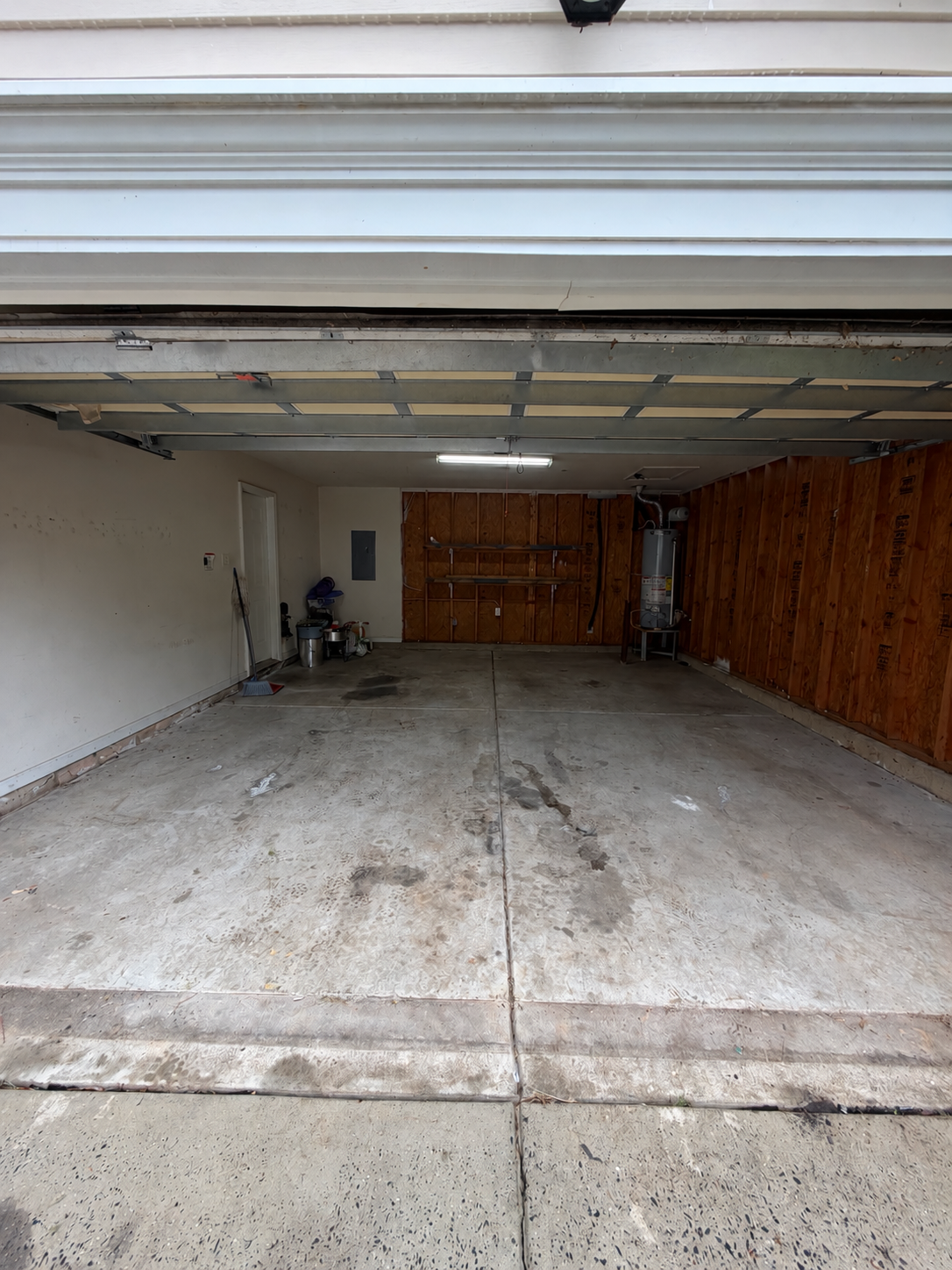 Empty garage after the Talking Junk cleanout